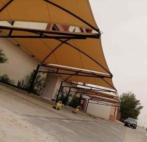 تركيب مظلات ساندوتش بانل وجميع اعمال الحداده 